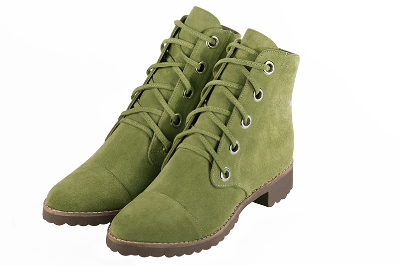 Women's pistachio green elegant ankle boots, with laces at the front. Round toe. Thick rubber soles - Front view